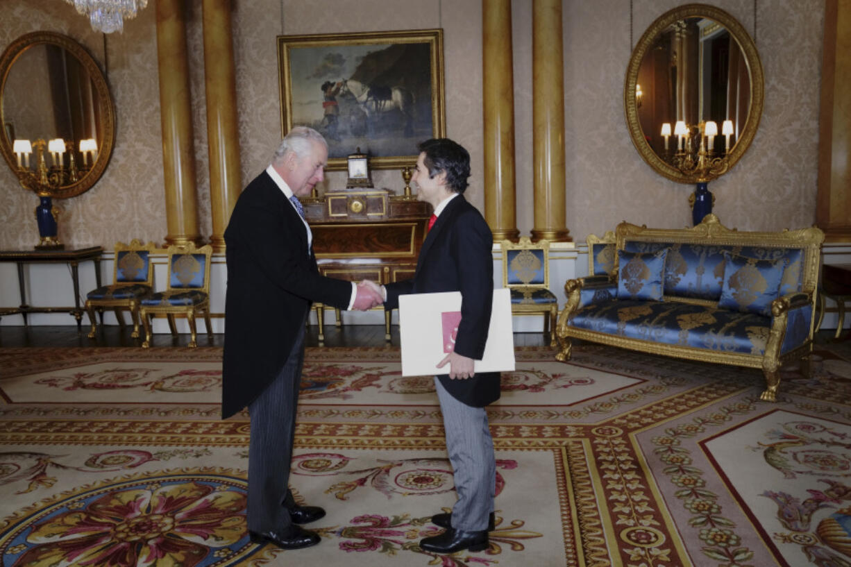 King Charles III receives the Ambassador of Turkey Koray Ertas, as he presents his credentials during a private audience at Buckingham Palace, London, Thursday March 24, 2023.