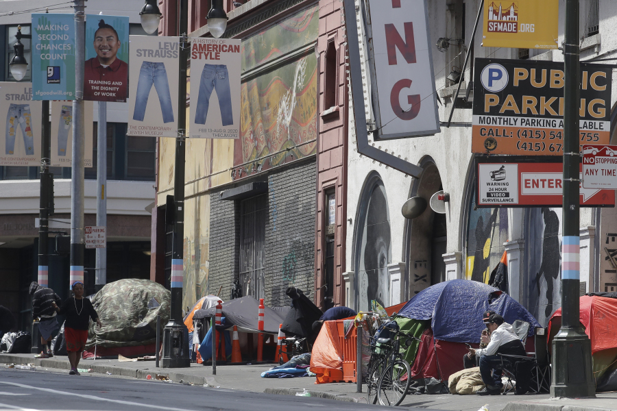 FILE - Tents line a sidewalk on Golden Gate Avenue in San Francisco, Saturday, April 18, 2020. California Gov. Gavin Newsom will discuss homelessness in Sacramento, Calif., on Thursday, March 16, 2023, to kick off a four-day policy tour in lieu of a traditional State of the State address.