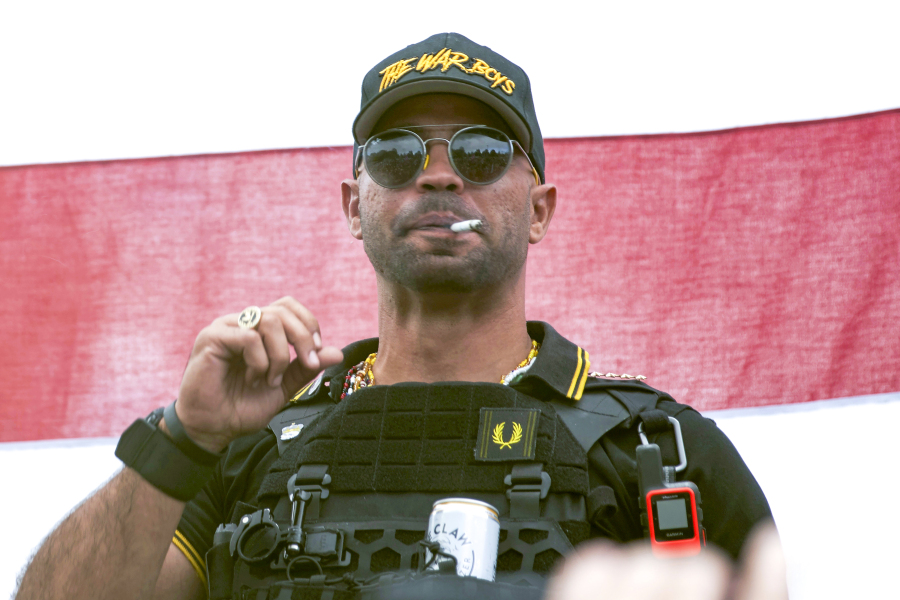 FILE - Proud Boys leader Henry "Enrique" Tarrio wears a hat that says The War Boys during a rally in Portland, Ore., Sept. 26, 2020. Federal prosecutors have rested their seditious conspiracy case against former Proud Boys leader Enrique Tarrio and four lieutenants charged with plotting to stop the peaceful transfer of presidential power from Donald Trump to Joe Biden after the 2020 election. Jurors will hear testimony by defense witnesses before they begin deliberating.