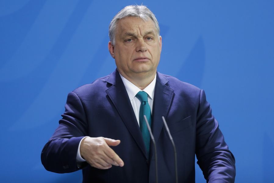 FILE - Hungary's Prime Minister Victor Orban briefs the media in Berlin, Germany, Monday, Feb. 10, 2020. Orban on Tuesday, Feb.