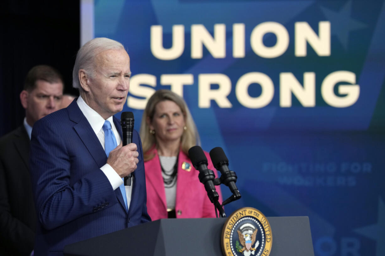 FILE - President Joe Biden speaks in the South Court Auditorium on the White House complex in Washington, Dec. 8, 2022, about the infusion of nearly $36 billion to shore up a financially troubled union pension plan, preventing severe cuts to the retirement incomes of more than 350,000 Teamster workers and retirees across the United States.