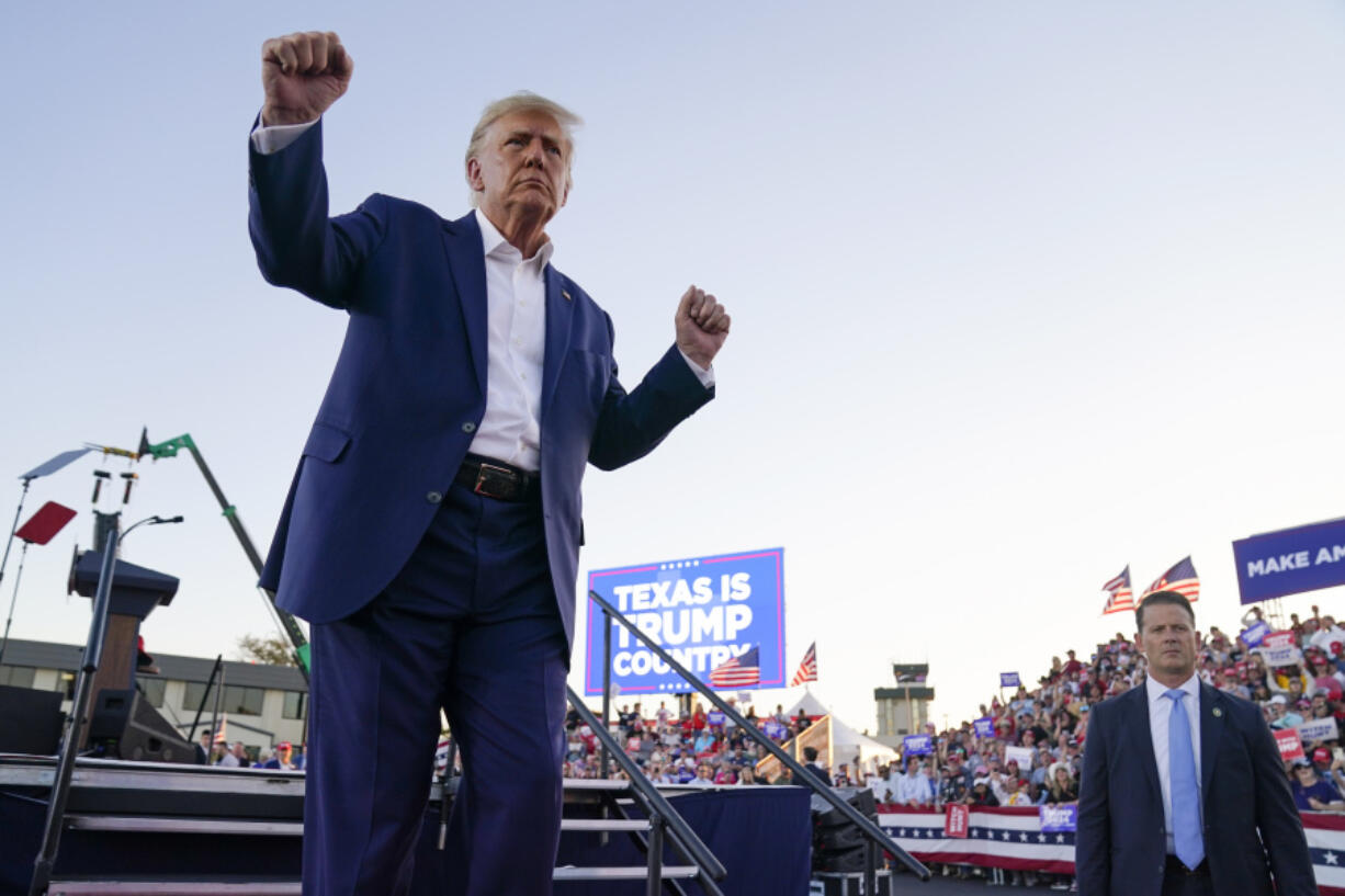 FILE - Former President Donald Trump dances during a campaign rally after speaking at Waco Regional Airport, March 25, 2023, in Waco, Texas. As Trump rails against possible indictment in New York, his team is leaning into a strategy that has quietly become a become a cornerstone of his campaign: releasing made-for-social media videos reacting to the news and outlining his agenda for a second term.