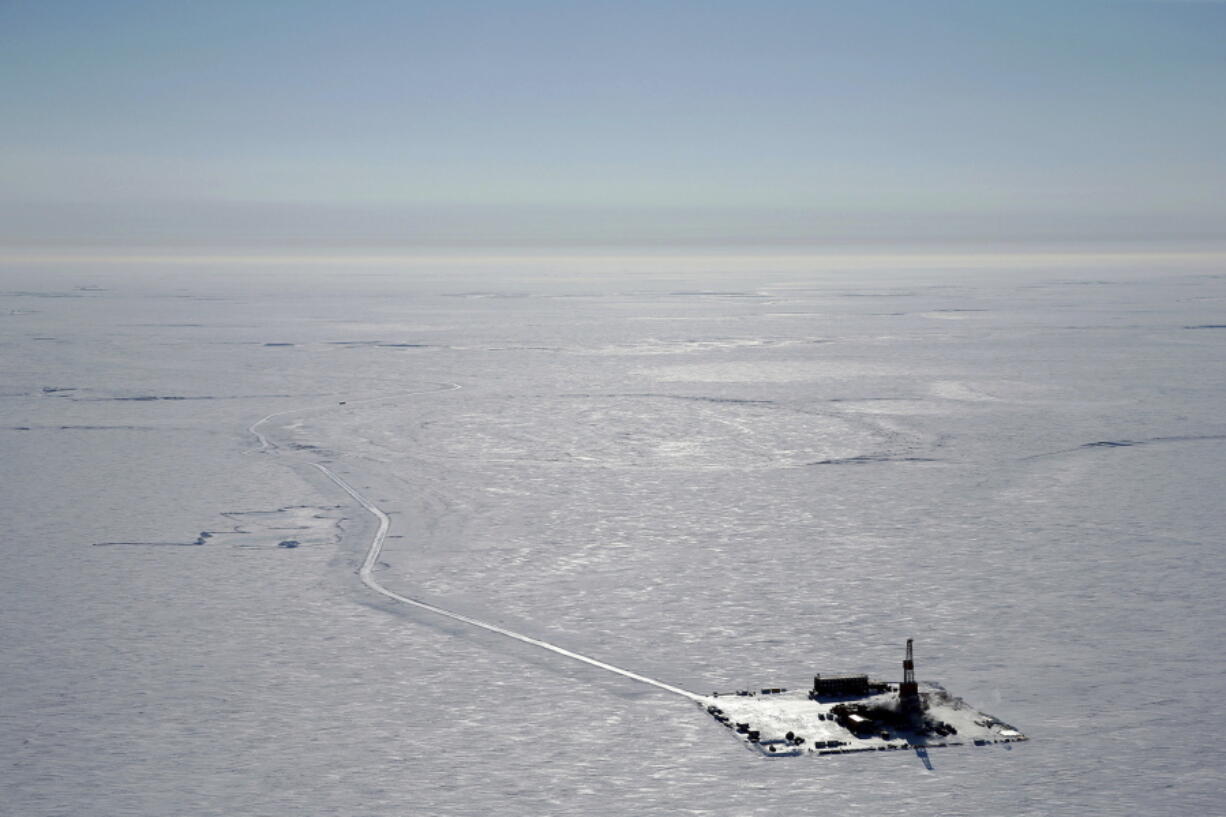 FILE - This 2019 aerial photo provided by ConocoPhillips shows an exploratory drilling camp at the proposed site of the Willow oil project on Alaska's North Slope. The Biden administration is weighing approval of a major oil project on Alaska's petroleum-rich North Slope that supporters say represents an economic lifeline for Indigenous communities in the region but environmentalists say is counter to Biden's climate goals. A decision on ConocoPhillips Alaska's Willow project, in a federal oil reserve roughly the size of Indiana, could come by early March 2023.