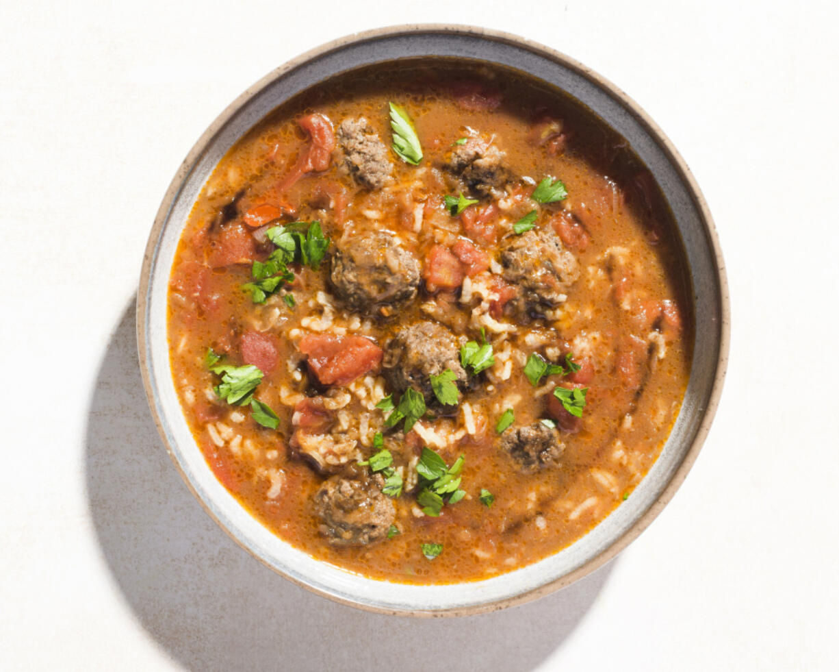 Syrian-style Meatball Soup With Rice and Tomatoes.