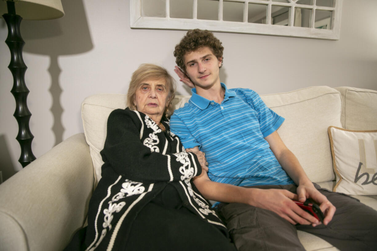 Holocaust survivor Tova Friedman, 85, prepares to record a TikTok video with her grandson, 17-year-old Aron Goodman, in Morristown, New Jersey, on Monday, March 13, 2023. Goodman records TikTok videos of his grandmother describing her experiences as a six-year-old at Auschwitz concentration camp that have millions of views on the social media platform.