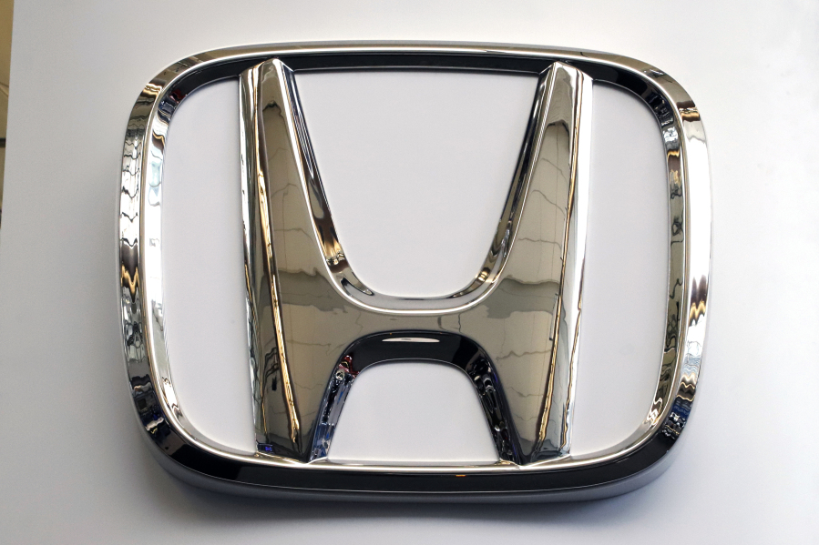 FILE- This Feb. 14, 2019 file photo shows a Honda logo at the 2019 Pittsburgh International Auto Show in Pittsburgh.    Honda is recalling a half-million vehicles in the U.S. and Canada, Wednesday, March 15, 2023, because the front seat belts may not latch properly. The recall covers some of the the automaker's top-selling models including the 2017 through 2020 CR-V, the 2018 and 2019 Accord, the 2018 through 2020 Odyssey and the 2019 Insight. Also included is the Acura RDX from the 2019 and 2020 model years.  (AP Photo/Gene J.