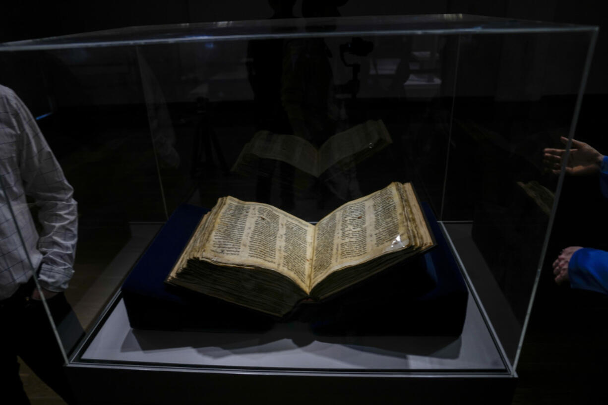The Codex Sassoon 1,100-year-old Hebrew Bible is on display at the Tel Aviv's ANU Museum of the Jewish People for a week-long exhibition of the manuscript, part of a whirlwind worldwide tour of the artifact in the United Kingdom, Israel and the United States before its expected sale, Israel, Wednesday, March 22, 2023. One of the oldest surviving biblical manuscripts is up for sale -- for a cool $30 million. The Codex Sassoon is a nearly complete 1,100-year-old Hebrew Bible. Sotheby's is putting it up for auction in New York in May for an estimated price of $30 million to $50 million.
