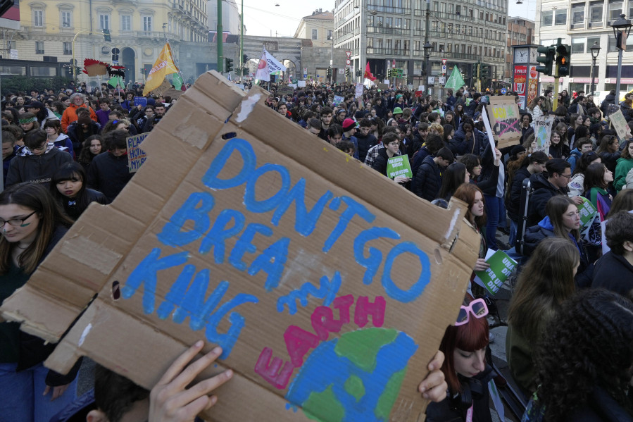 People take part in a Fridays For Future demonstration in Milan, Italy, Friday, March 3, 2023. The climate protection movement Fridays For Future had called for new protests in numerous countries on Friday.