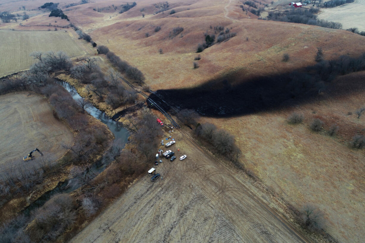 FILE - In this photo taken by a drone, cleanup continues in the area where the ruptured Keystone pipeline dumped oil into a creek in Washington County, Kan., on Dec. 9, 2022. A faulty weld at a bend in an oil pipeline contributed to a spill that dumped nearly 13,000 bathtubs' worth of crude oil into a northeastern Kansas creek, the pipeline's operator said Thursday, Feb. 9, 2023, estimating the cost of cleaning it up at $480 million.