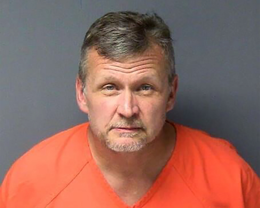 FILE - This booking photo provided by the Columbia County, Wis., Sheriff's Office shows Brian Higgins. Higgins, a Wisconsin man who made a surveillance drive past the home of Michigan's governor during a scheme to kidnap her in 2020, is returning to court to change his not-guilty plea, records show.