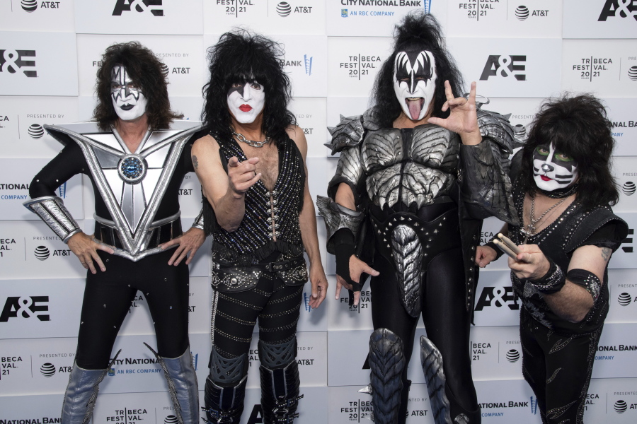 FILE - Members of the band Kiss, from left, Tommy Thayer, Paul Stanley, Gene Simmons and Eric Singer attend the premiere of A&E Network's "Biography: KISStory" in New York on June 11, 2021. Kiss have announced the final shows of their last tour, planning to hang up their platform boots after two back-to-back shows at Madison Square Garden in New York at the end of 2023.