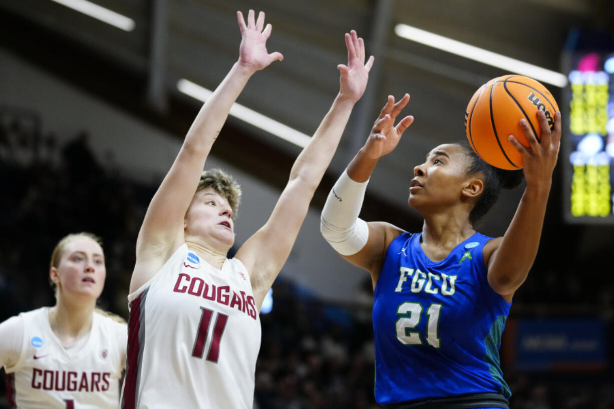Florida Gulf Coast's Kierra Adams shoots against Washington State's Astera Tuhina during the second half of a first-round college basketball game in the NCAA Tournament, Saturday, March 18, 2023, in Villanova, Pa.