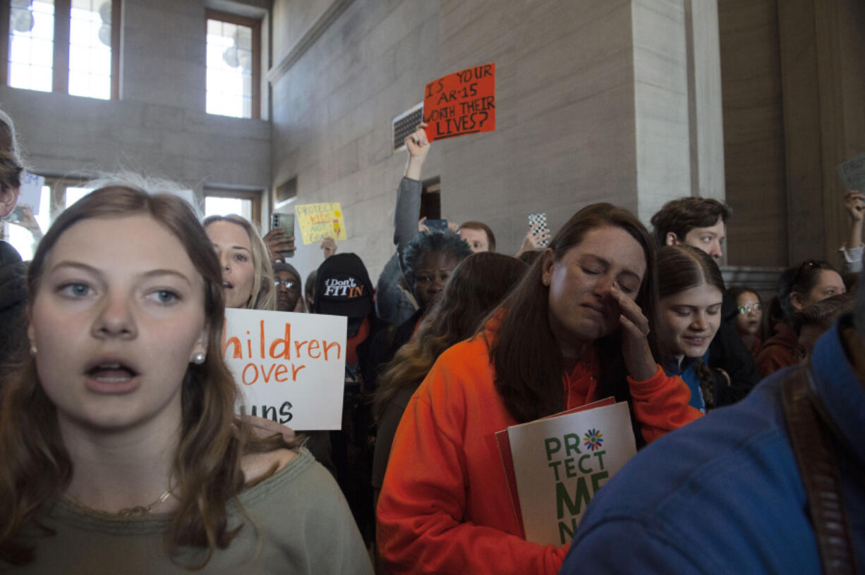 Protesters fill the capitol building as representatives make their way towards the House chamber doors at the State Capitol Building in Nashville , Tenn., Thursday, March 30, 2023.
