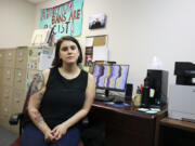FILE - Katie Qui?onez, executive Director of the Women's Health Center of West Virginia, sits in her office at the clinic in Charleston, W.Va. on June 29, 2022. A new abortion provider, the Women's Health Center of Maryland, is opening this year in the Democratic-controlled state -- just across from deeply conservative West Virginia, where state lawmakers recently passed a near-total abortion ban.