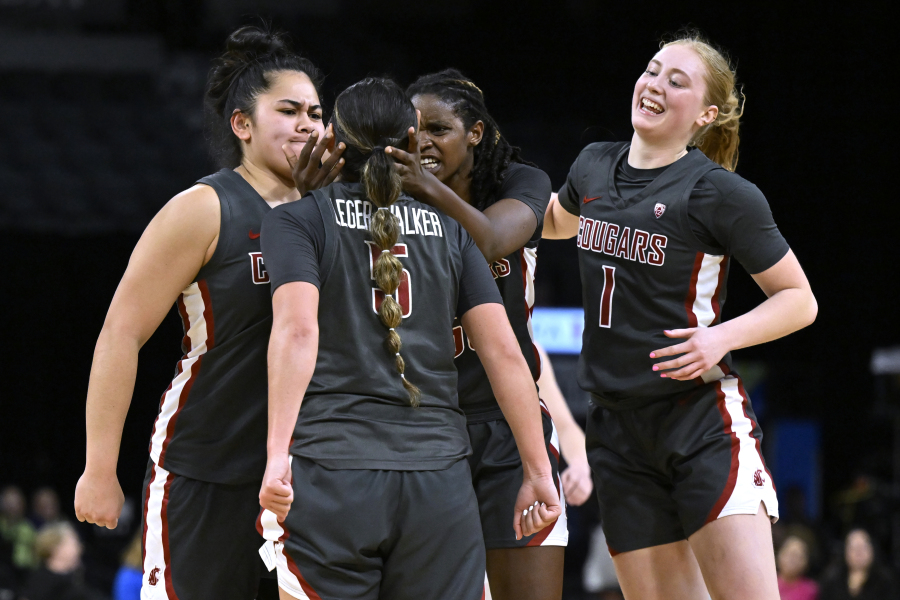 Washington State celebrates a 3-pointer by guard Charlisse Leger-Walker's (5) against Utah during the second half of an NCAA college basketball game in the quarterfinals of the Pac-12 women's tournament Thursday, March 2, 2023, in Las Vegas.