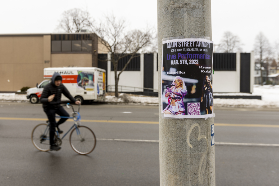 A flyer for Kream Kalari and GloRilla hangs on a post outside of the Main Street Armory on Monday, March 6, 2023, in Rochester, N.Y.