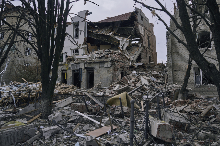 Heavily damaged building seen after a Russian attack in Sloviansk, Donetsk region, Ukraine, Monday, March 27, 2023.