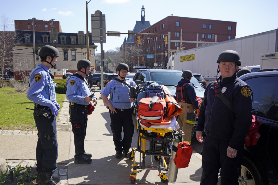 Pittsburgh Police and paramedics respond to Pittsburgh Central Catholic High School for what turned out to be a hoax report of an active shooter, on Wednesday, March 29, 2023 in the Oakland neighborhood of Pittsburgh. (AP Photo/Gene J.
