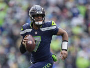 Seattle Seahawks quarterback Geno Smith finally got to enjoy a day of being in the spotlight after signing the big contract that had eluded most of his career. Smith's three-year contract with the Seahawks will keep him as the presumptive starting quarterback in Seattle following a breakout season.