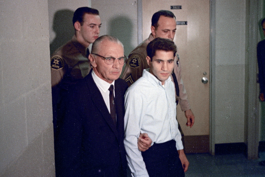 FILE - This June 1968 photo shows Sirhan Sirhan, right, accused assassin of Sen. Robert F. Kennedy, with his attorney Russell E. Parsons in Los Angeles. In 2021, a California parole board voted to free Robert F. Kennedy's assassin but the decision was overturned by the governor. Sirhan Sirhan will once again appear before the board Wednesday, March 1, 2023, at a hearing at a federal prison in San Diego County to again seek their approval for his release.