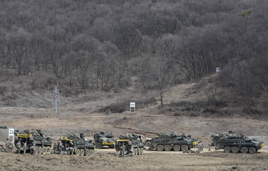 U.S. Army soldiers prepare for their exercise at a training field in Paju, South Korea, near the border with North Korea, Friday, March 17, 2023.