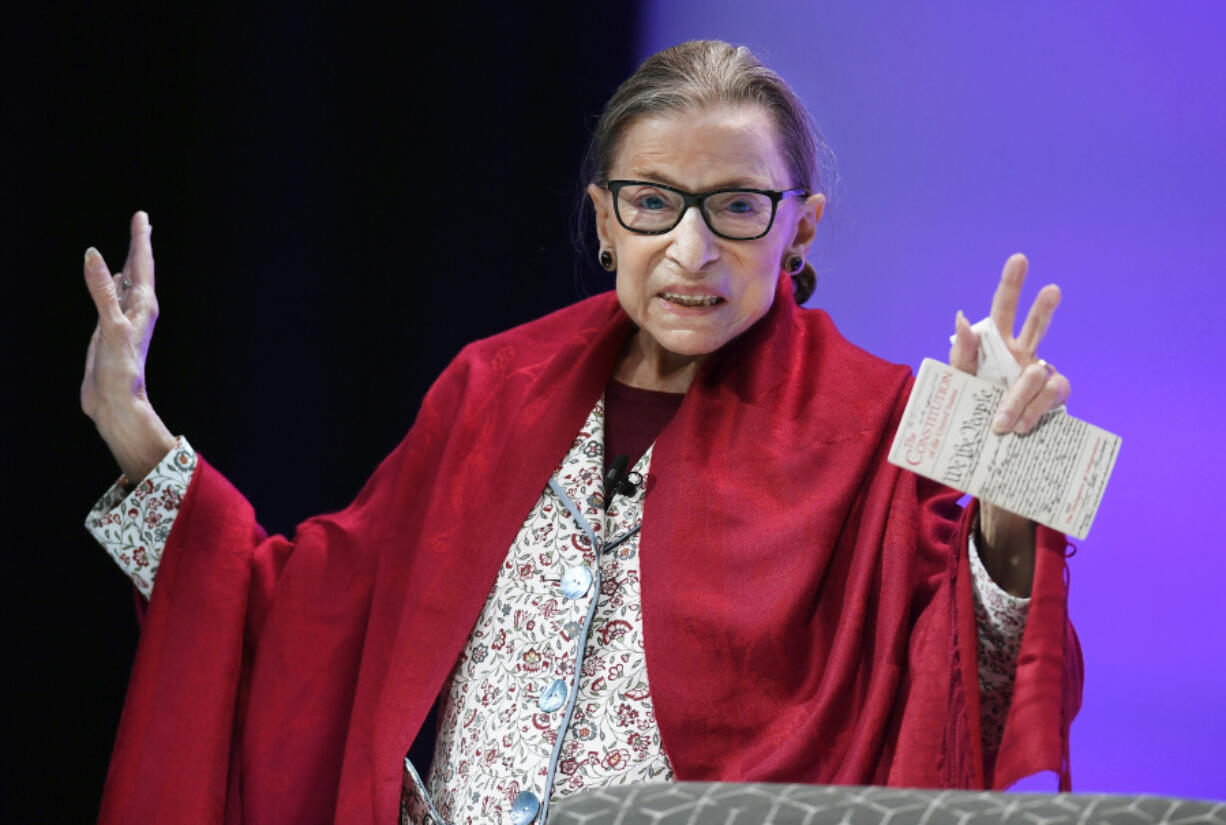 FILE - In this Oct. 3, 2019 file photo, U.S. FILE - Supreme Court Justice Ruth Bader Ginsburg gestures to students before she speaks at Amherst College in Amherst, Mass, on Oct. 3, 2019. Ginsburg is being remembered during ceremonies at the Supreme Court on Friday, March 17, 2023.