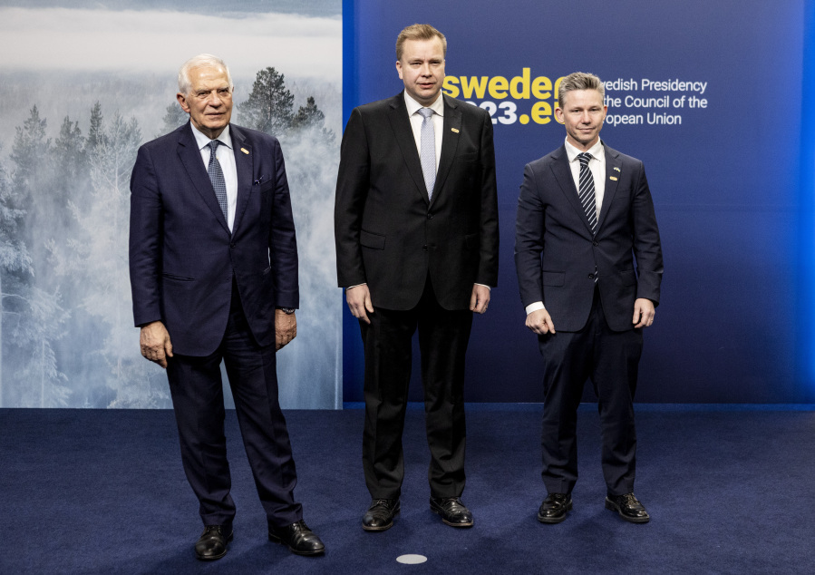 European Union Foreign Minister Josep Borrell Fontelles, left, and Sweden's Defence Minister Pal Jonsson, right, receive Finlands Defence Minister Antti Kaikkoneat the informal meeting of EU defence ministers, outside Stockholm, Sweden Wednesday March 8, 2023.
