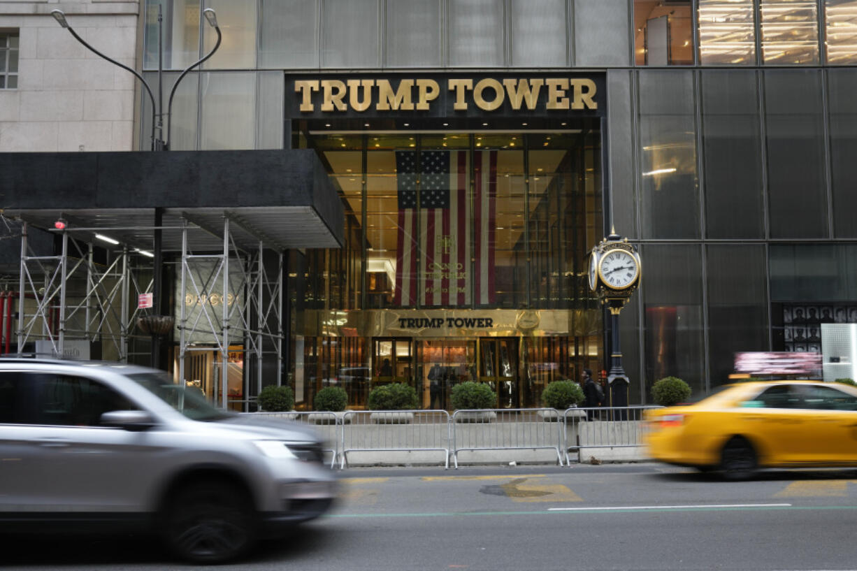 Cars pass Trump Tower in New York, Wednesday, March 22, 2023.