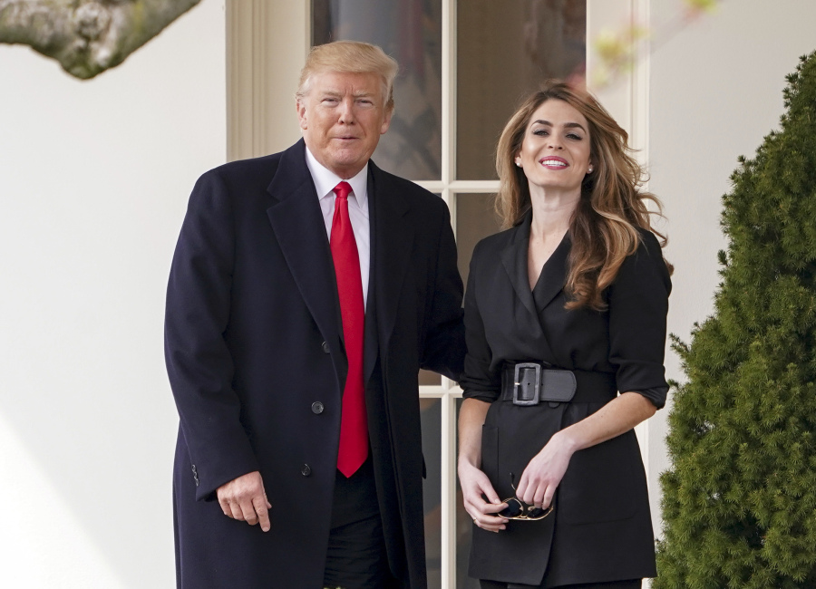 FILE - President Donald Trump poses for members of the media with then White House Communications Director Hope Hicks on her last day before he boards Marine One on the South Lawn of the White House, March 29, 2018, in Washington. Hicks, Trump's former spokeswoman, met Monday, March 6, 2023, with Manhattan prosecutors investigating hush-money payments made on the ex-president's behalf -- the latest member of the Republican's inner circle to be questioned in the renewed probe.