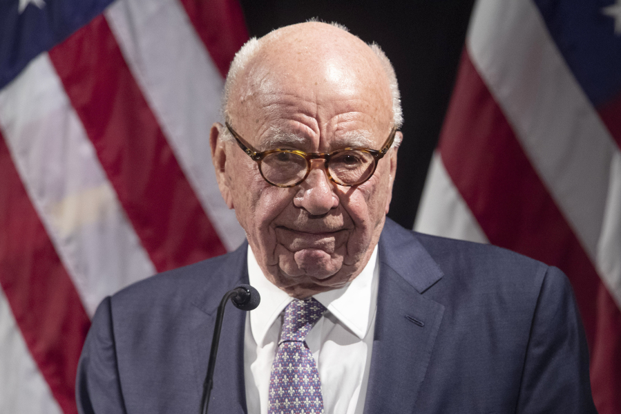 FILE - Rupert Murdoch introduces Secretary of State Mike Pompeo during the Herman Kahn Award Gala, Oct. 30, 2019, in New York. A defamation lawsuit against Fox News is revealing blunt behind-the-scenes opinions by its top figures about Donald Trump, including a Tucker Carlson text message where he said "I hate him passionately." Carlson's private conversation was revealed in court papers at virtually the same time as the former president was hailing the Fox News host on social media for a "great job" for using U.S. Capitol security video to produce a false narrative of the Jan. 6, 2021, insurrection.