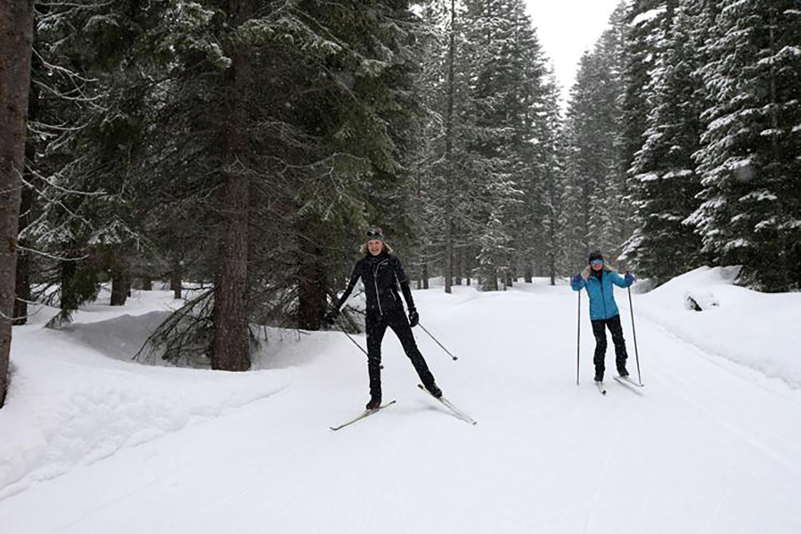 Bend, Ore., cross-country skate skiiers Jacqi Fifield, left, and Nancy Mishalanie enjoy trails at Virginia Meissner Sno-park on March 14.
