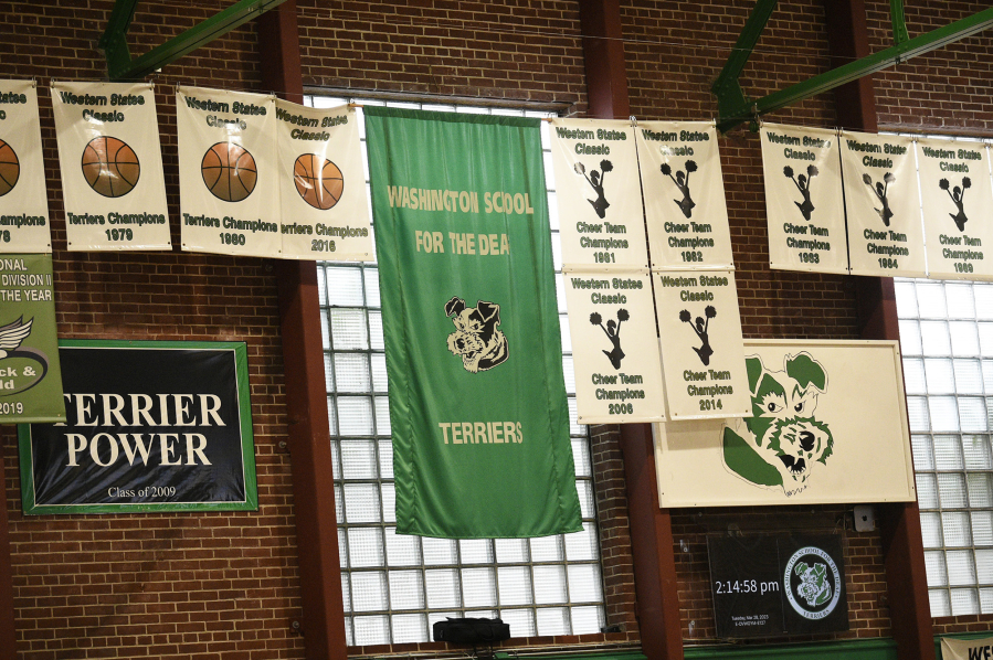 Banners hang in the gymnasium at the Washington School for the Deaf on Tuesday, March 28, 2023. The school will receive nearly $15.4 million from the recently approved state capital budget for additional construction costs for a physical education building and other improvement projects.
