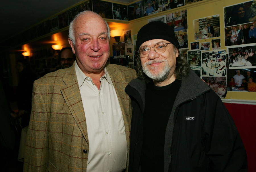 Sire Record Group Chairman Seymour Stein, left, and musician Tommy Ramone of the Ramones on March 13, 2005, in New York City. Stein died Sunday at the age of 80.