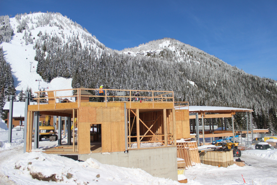 Crystal Mountain Resort's base area has looked different this winter as construction workers build out a new base lodge, the Mountain Commons, slated to open for the 2023-2024 season.