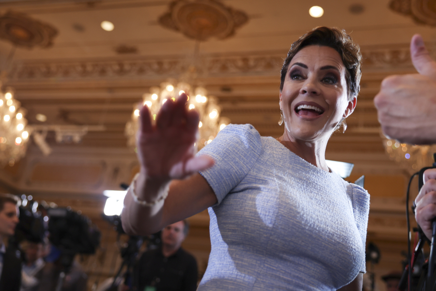 Kari Lake, Republican nominee in the 2022 Arizona gubernatorial election and a supporter of former U.S. President Donald Trump, greets guests before the start of an event hosted by Trump at Mar-a-Lago April 4, 2023, in West Palm Beach, Florida. Earlier in the day, Trump pleaded not guilty to 34 felony counts stemming from hush money payments in 2016 to two women, becoming the first former U.S. president in history to be charged with a criminal offense.