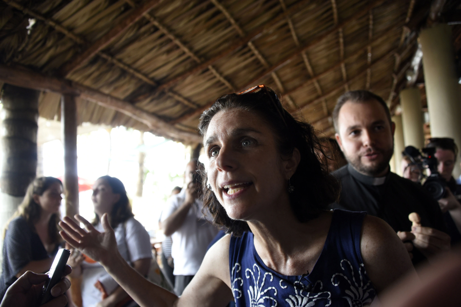 Rebecca Gomperts,  right, founder of the Dutch organization Women on Waves, speaks after a press conference at the Pez Vela Marina in the port of San Jose, Escuintla department, south of Guatemala City, on Feb. 23, 2017.