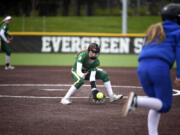Evergreen pitcher Delaney Bollman fields a ground ball during a 3A Greater St. Helens league softball game against Mountain View on April 21 at Evergreen High.