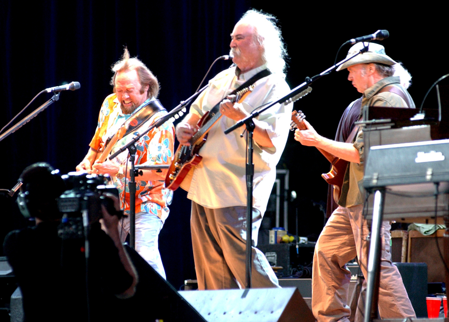 Steven Stills (left), David Crosby (center) and Neil Young perform during a Crosby, Stills, Nash and Young concert at Nissan Pavilion in Bristow, Virginia, on Aug. 12, 2006. Crosby died last January.
