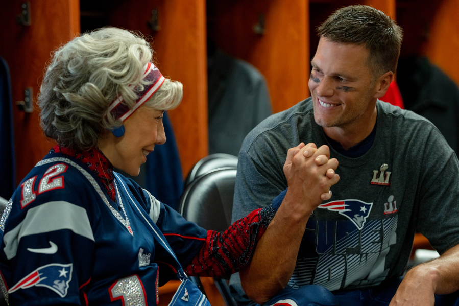 Lily Tomlin, left, and Tom Brady in "80 for Brady." (Scott Garfield/Paramount Pictures/TNS)