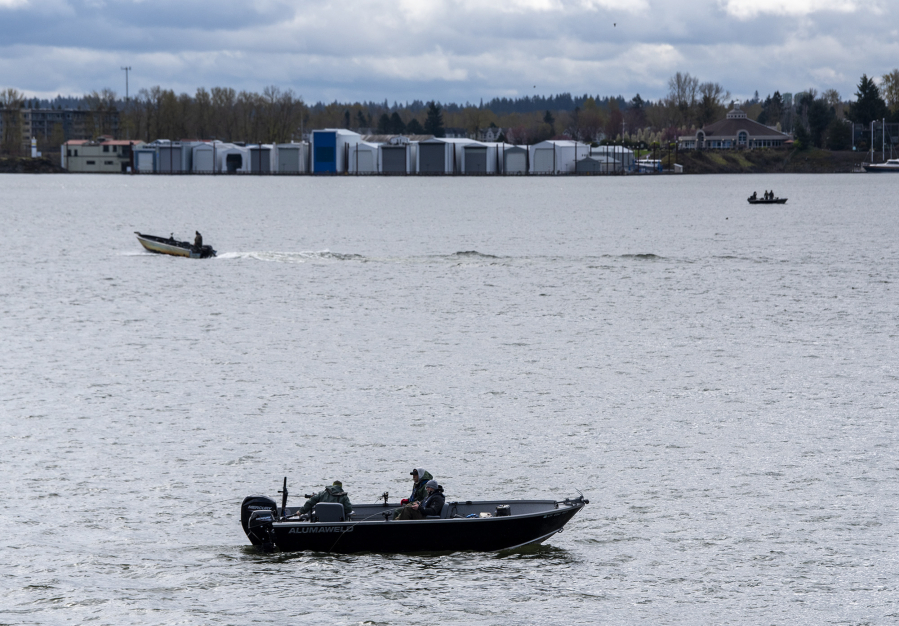 Anglers gather on the Columbia River on Tuesday, as seen from Waterfront Park. As of April 13, spring chinook runs are below the 10-year average, 637 compared to 2,210 on the same date.