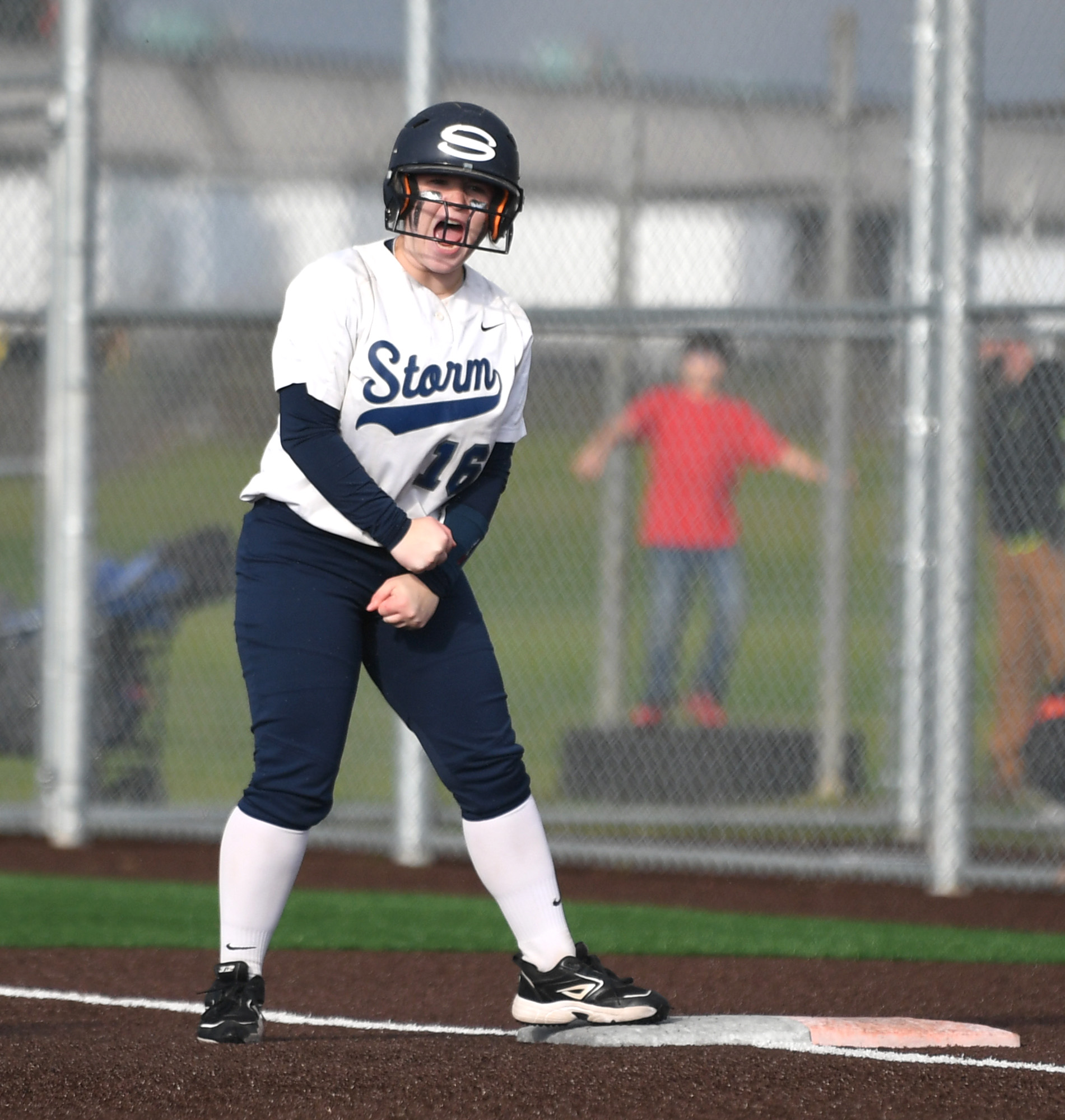 Skyview sophomore Layla Royle celebrates at first base Wednesday, April 12, 2023, during the Storm’s 4-0 win against Battle Ground at Fort Vancouver High School.