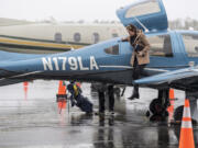 Pilot Margaux Retherford steps out of a KinectAir Diamond DA62 at Atlantic Aviation PDX in Portland. The on-demand airline can land at any public airport in the region.
