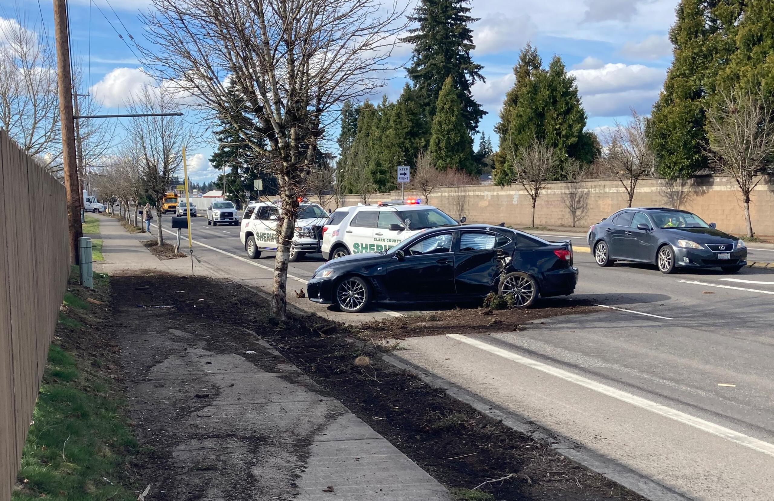 The crash scene March 14 on Northeast Covington Road at 73rd Street. Clark County sheriff's deputies are seeking information after they say the driver and his 9-year-old child ran from the scene.