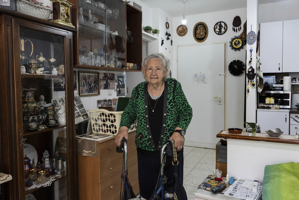 Holocaust survivor Tova Gutstein, 90, who lived in the Warsaw Ghetto as a child, poses for a photo at her apartment in the city of Rishon Lezion, Israel, Sunday, April 9, 2023. Gutstein was a child when the Nazis put down the Warsaw Ghetto Uprising. Now 90, she is one of the few remaining survivors who witnessed that act of Jewish resistance against Nazi Germany as Israel marks the revolt's 80th anniversary on Holocaust Memorial Day.