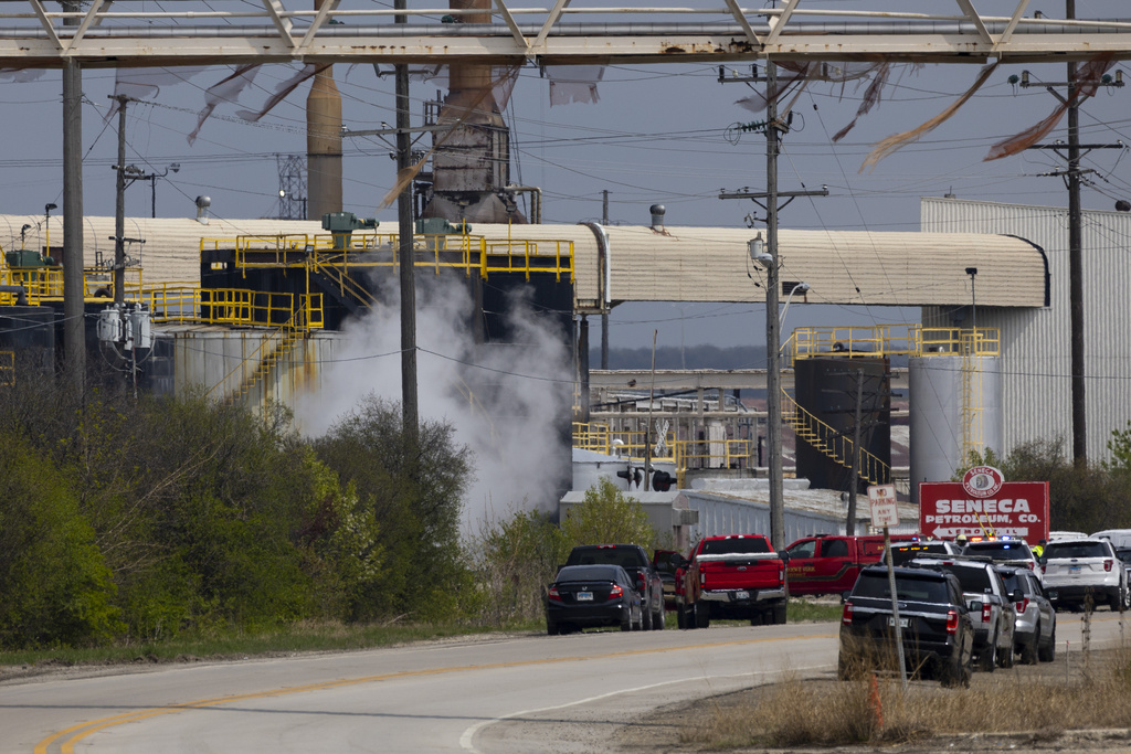 Emergency crews respond to an explosion at the Seneca Petroleum Company in Lemont, Ill., Tuesday, April 25, 2023. An explosion at the suburban Chicago petroleum plant killed one person and injured a second Tuesday morning, authorities said. (Eileen T.