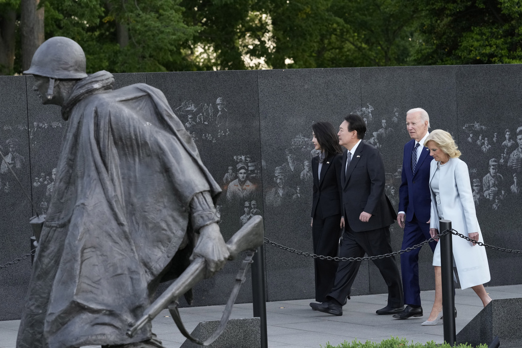 President Joe Biden, first lady Jill Biden, South Korea's President Yoon Suk Yeol and his wife Kim Keon Hee visit the Korean War Veterans Memorial in Washington, Tuesday, April 25, 2023.