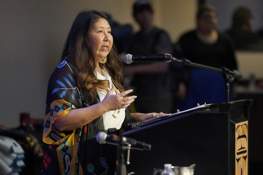 FILE - Washington Rep. Debra Lekanoff, D-Bow, speaks on March 31, 2022, before Washington Gov. Jay Inslee signed a bill sponsored by Lekanoff that creates a first-in-the-nation statewide alert system for missing Indigenous people — particularly women, in Quil Ceda Village, near Marysville, Wash., north of Seattle. A new law in Washington state establishes a cold case unit to investigate unsolved cases of missing and murdered Indigenous people. House Bill 1177 was recommended by a state task force, passed unanimously in the Legislature and was signed last week by Gov. Inslee. (AP Photo/Ted S.