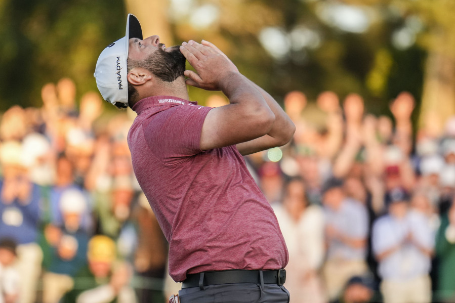 Jon Rahm, of Spain, celebrates on the 18th green after winning the Masters golf tournament at Augusta National Golf Club on Sunday, April 9, 2023, in Augusta, Ga.