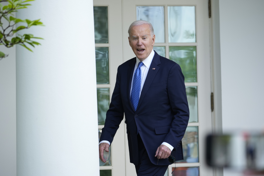 President Joe Biden reacts to questions from members of the media as he walks back to the White House after speaking during a ceremony honoring the Council of Chief State School Officers' 2023 Teachers of the Year in the Rose Garden of the White House, Monday, April 24, 2023 in Washington.