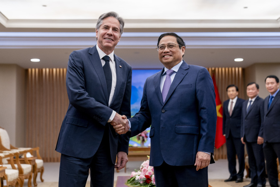 U.S. Secretary of State Antony Blinken, left, meets with Vietnamese Prime Minister Pham Minh Chinh at the Office of the Government in Hanoi, Vietnam, Saturday, April 15, 2023.